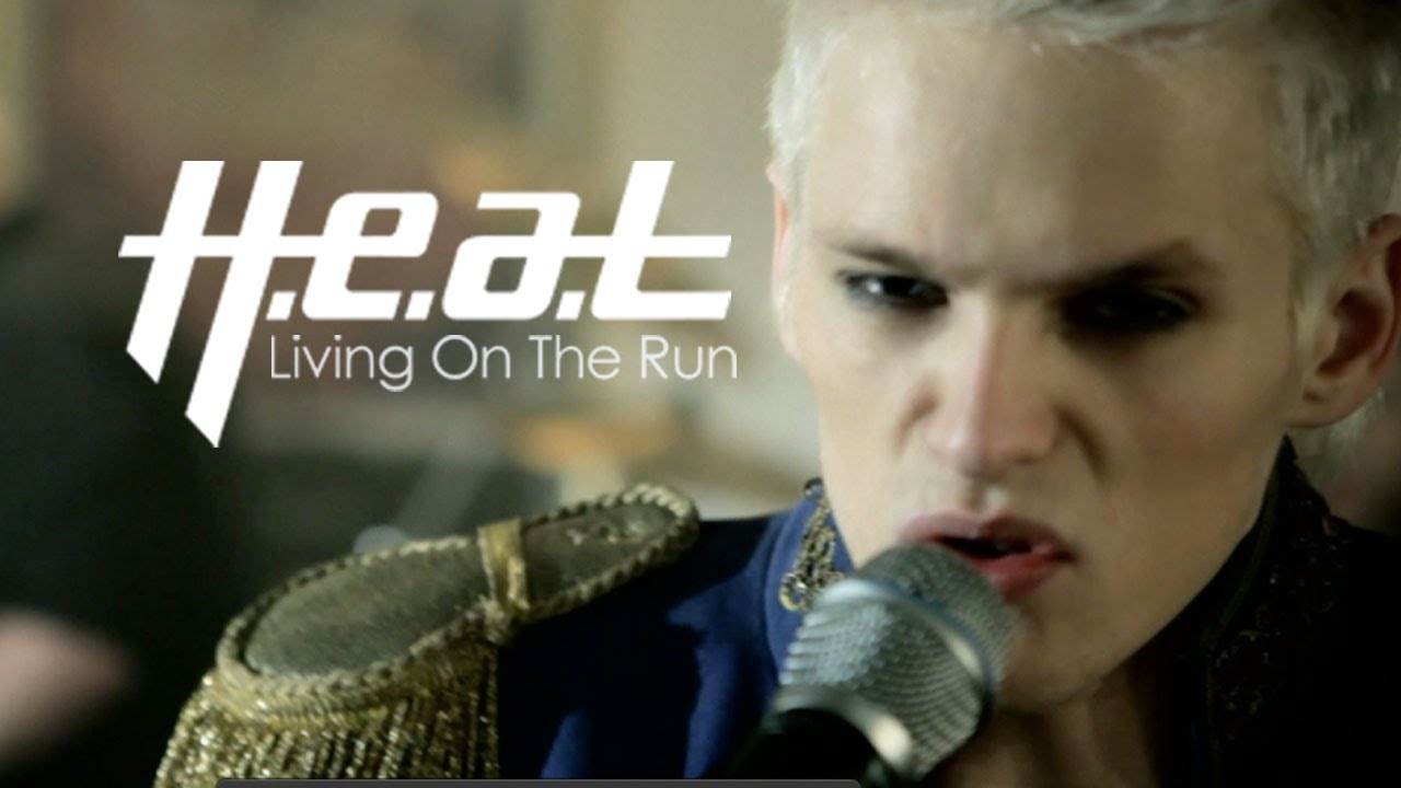 Novo Clip = “H.e.a.t – Living On The Run”